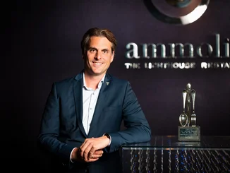 Thomas Mack at Ammolite - The Lighthouse Restaurant Thomas Mack with the restaurant award for 2 Michelin stars at Ammolite - The Lighthouse Restaurant.