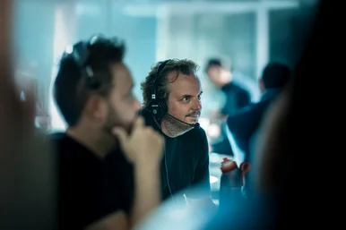 Michael Mack Michael Mack at work with a headset and focused gaze.