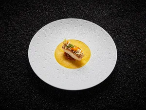 The fish course of the eight-course menu The fish course of the eight-course menu promises a unique culinary experience.