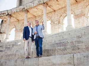 Roland and Jürgen Mack The brothers Roland and Jürgen Mack stand on the Colosseum arch in the courtyard of the themed 4* superior hotel ‘Colosseo’.
