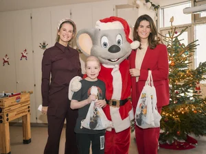 Miriam Mack Children's Cancer Clinic Miriam Mack and Ed Euromaus (dressed as Father Christmas) visit patients at a children's cancer clinic.
