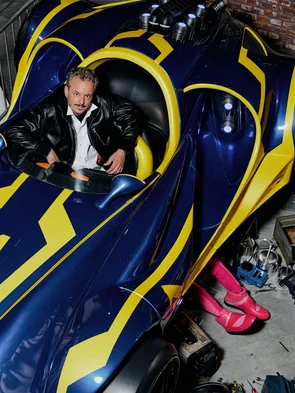 Michael Mack FOCUS STYLE Michael Mack sits in a racing car in the waiting area of the GRAND PRIX EDventure attraction.