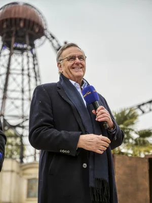 Opening of the Croatian themed area Roland Mack gives a speech at the opening of the Croatian themed area. In the background, Voltron Nevera powered by Rimac.