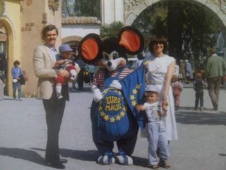 Family photo of the Mack family with Euromaus A group photo of Roland and Marianne Mack with Euromaus and the Macks' children, Thomas and Michael, when they were young.