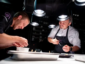 Head chef Peter Hagen-Wiest (right) Chef Peter Hagen-Wiest and a team member prepare unique creations.
