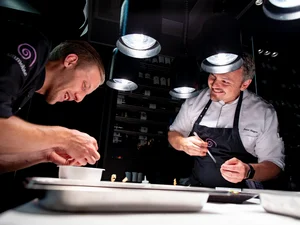 Head chef Peter Hagen-Wiest (right) Chef Peter Hagen-Wiest and a team member prepare unique creations.